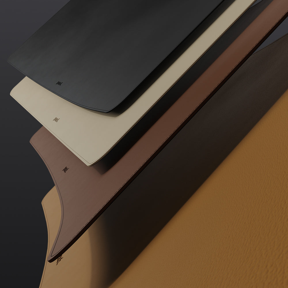 Minimal, sleek aesthetics blend seamlessly into any workspace.
Finished with edge-to-edge stitching for added durability and refinement, available in Danish Black, Cinnamon Brown, Caramel Tan, and Texas Sand—elegantly packaged and gift-ready.