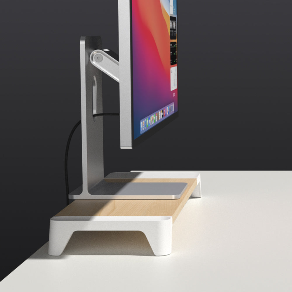 After a long day of work, slide your keyboard and mouse into the space below to clear the clutter at your workspace